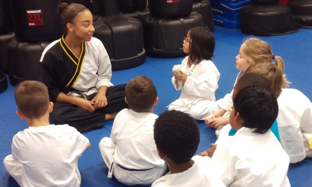 video-image-of-alex-with-little-champions-1